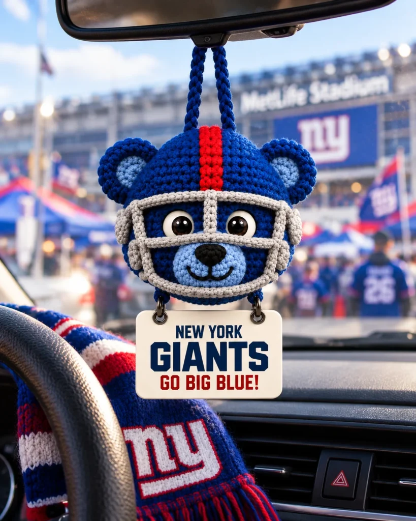 Big Blue crochet car hanging on a car rearview mirror at the stadium