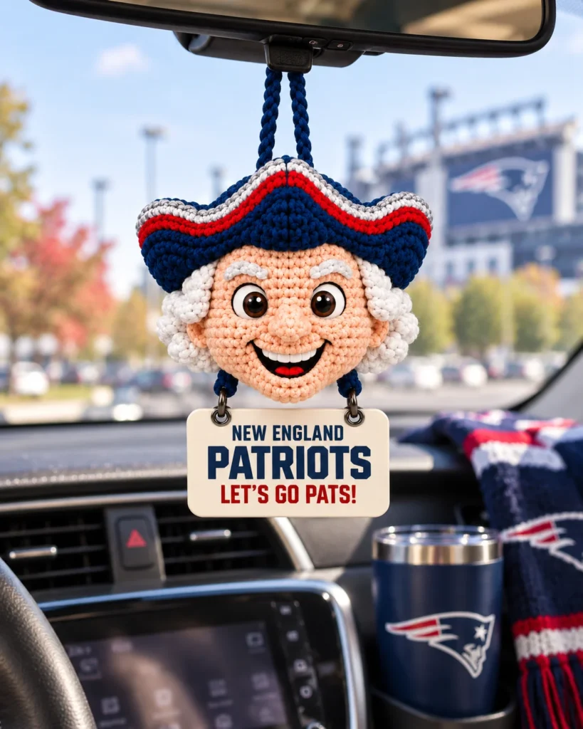 Pats crochet car hanging on a car rearview mirror